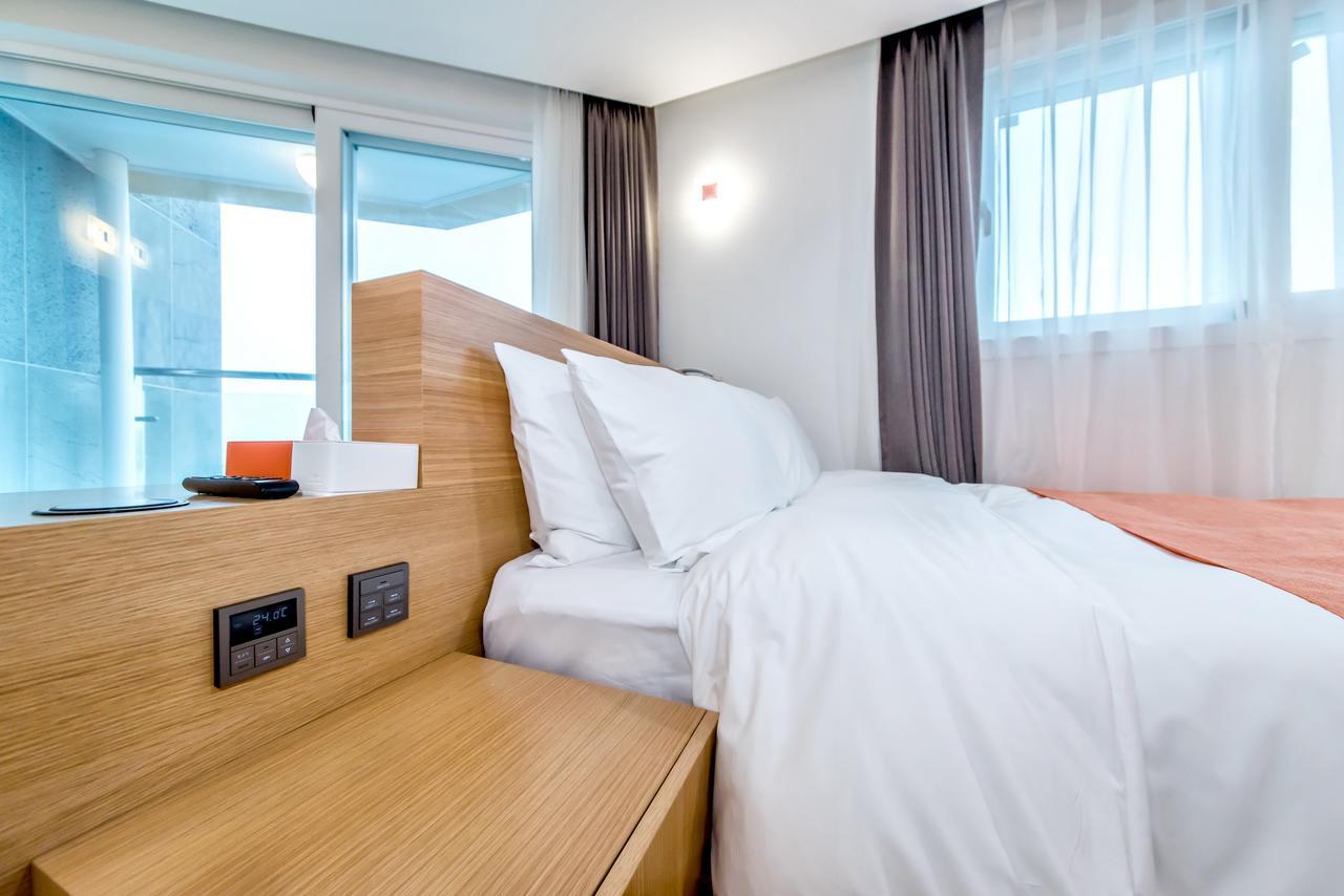 Co-Op City Hotel Seongsan Согвипхо Экстерьер фото